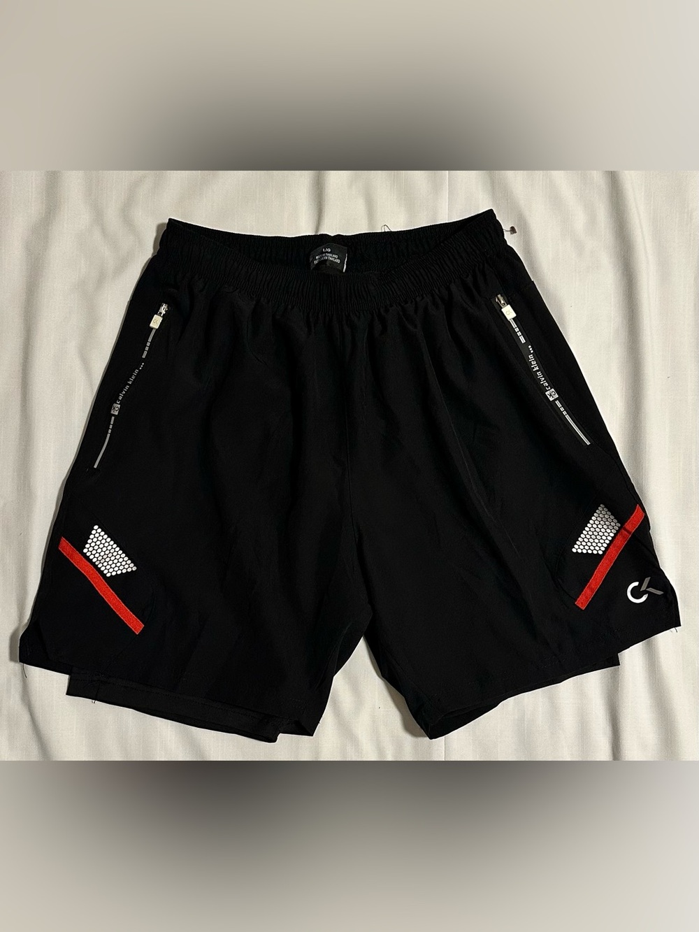 Calvin Klein Performance Black Athletic Shorts with Red Accents